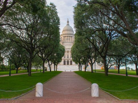Iowa Republicans in battleground House races join vote to halt the Iran war — Politics coverage by Daily American Press. P...